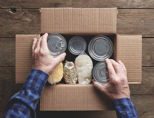 SIMM Associates employees collect canned foods for local branch of the Food Bank of Delaware