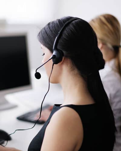 Customer service representative female employee working in the office